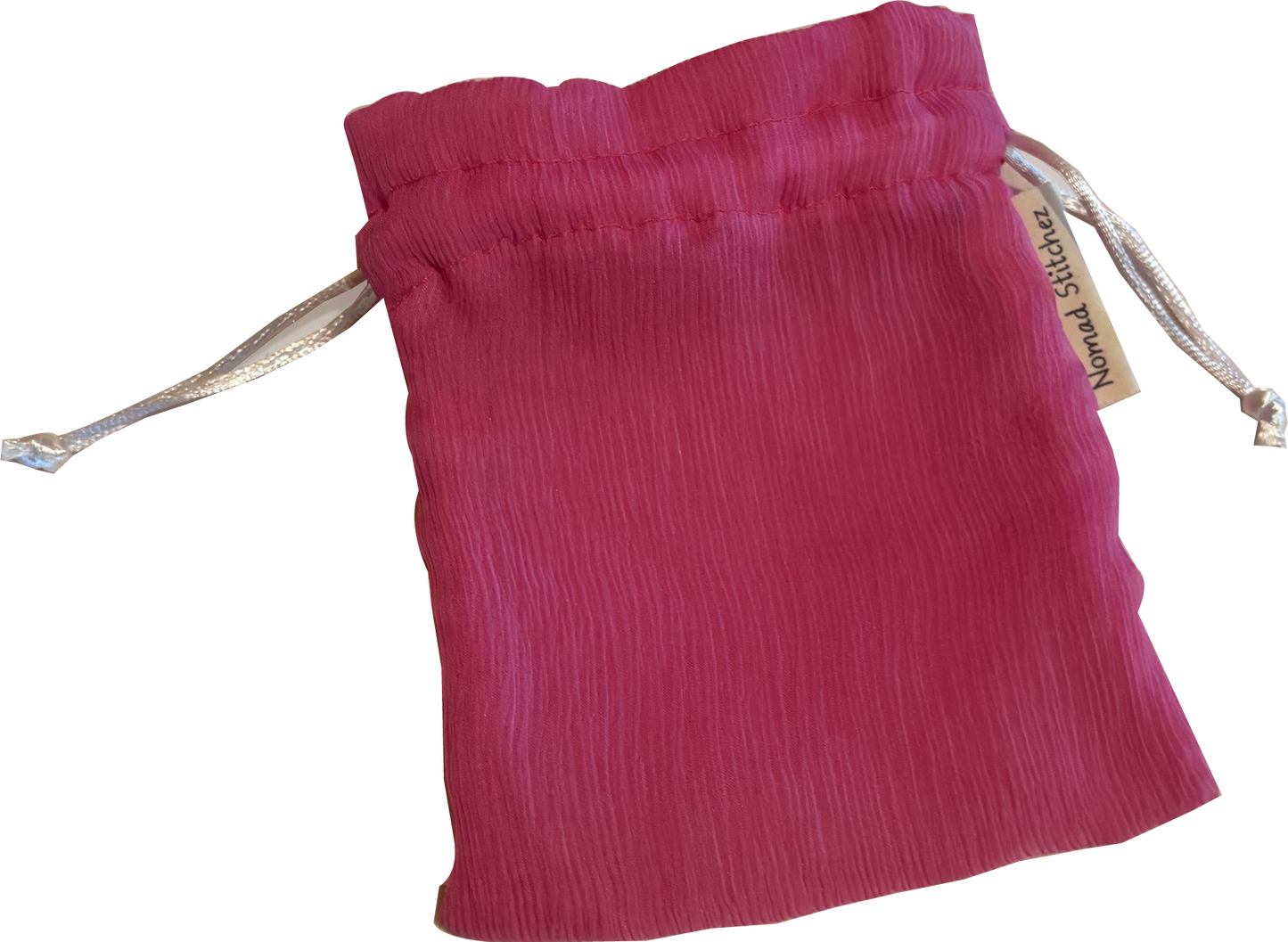 Pink silk satchel with a soft sheen, featuring a drawstring closure—ideal for holding crystals, jewelry, or small keepsakes.