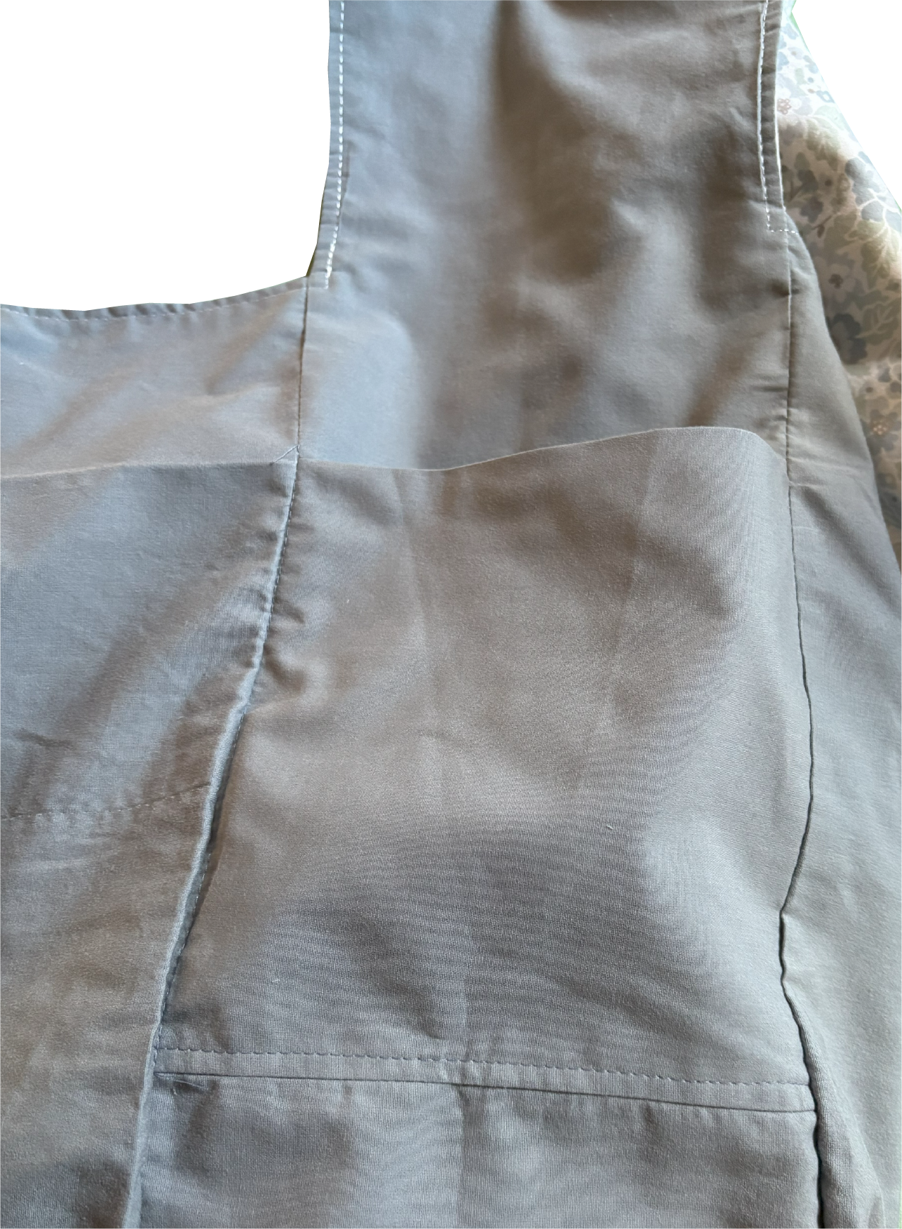 Interior view of Blue Ditsy Floral Sling Bag with dusty blue solid lining and internal pockets for organized storage.