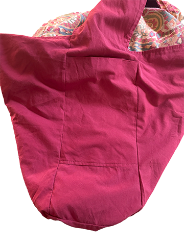 Interior of handcrafted 1/2 pint stitch bag made from repurposed natural fiber textiles, featuring two internal pockets for easy organization.