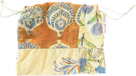 Small Artisan VersiBag made from patchwork 100% cotton batiste with handstamped Indian prints, French seams, and hemp string closure.