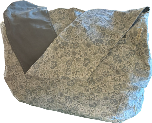 Front view of Blue Ditsy Floral Sling Bag with soft blue ditsy floral print, handcrafted from repurposed textiles.