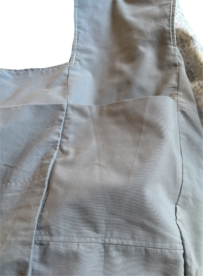 Interior view of Blue Ditsy Floral Sling Bag with dusty blue solid lining and internal pockets for organized storage.